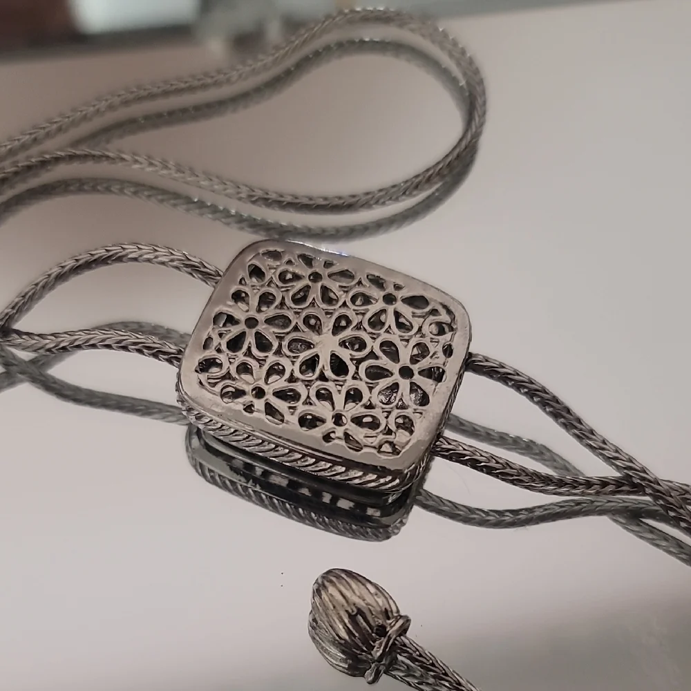 NWOT Silver Bolo Tie With Mother Of Perl Accent.